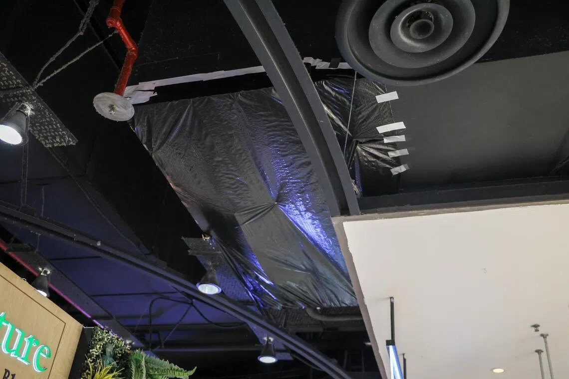 Ceiling panel in Square 2 mall falls, possibly due to prolonged moisture exposure; no injuries