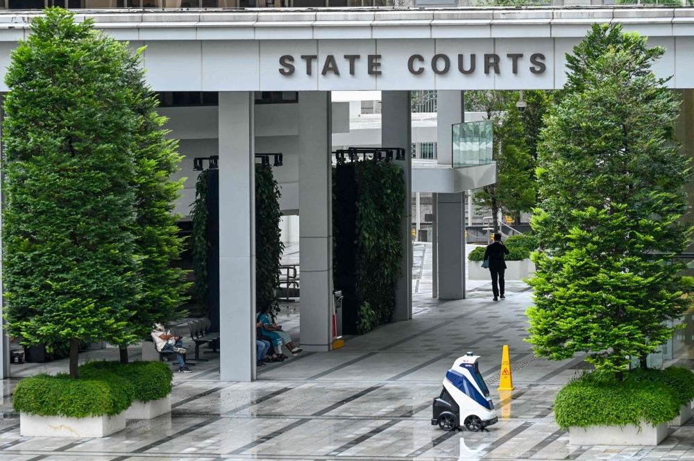 Man jailed nine months in Singapore after pushing 78-year-old who attacked his father, causing fall