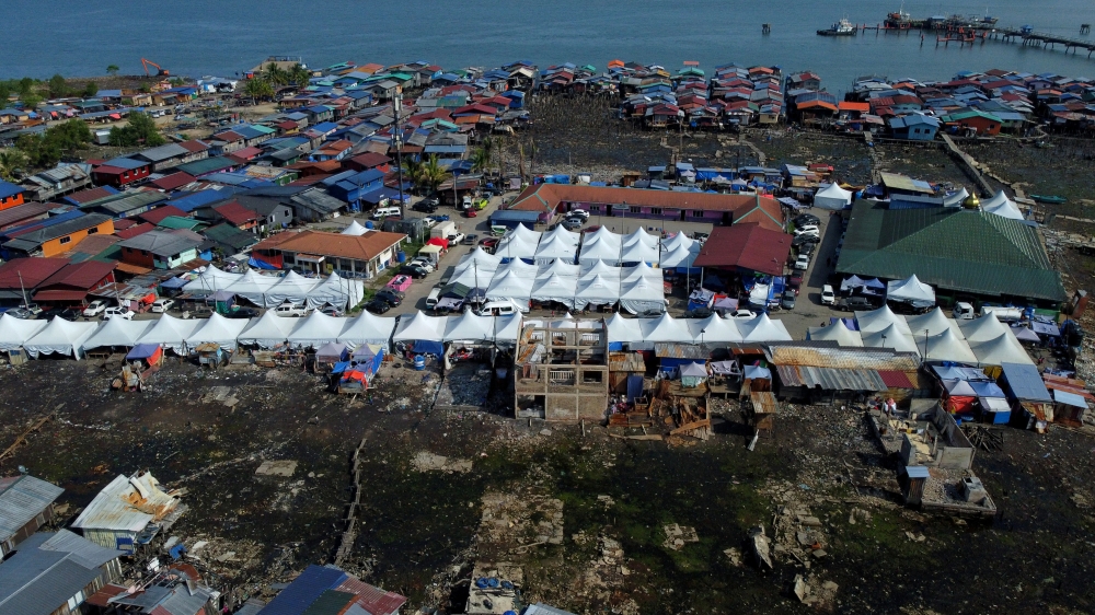 ‘This is where we were born’: 9,000 Kampung Bahagia residents wait to rebuild five months after devastating fire