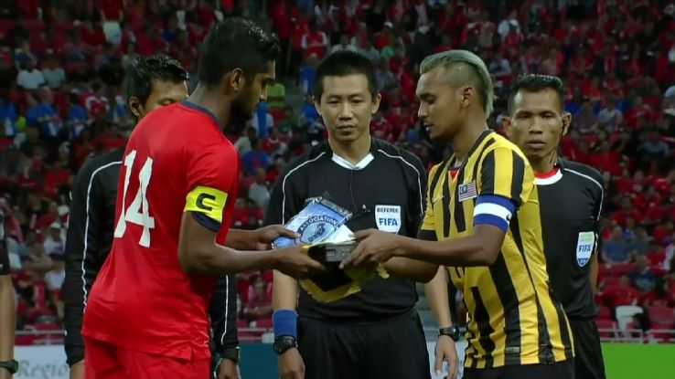 Malaysia brace for troubles ahead despite dogged Singapore draw