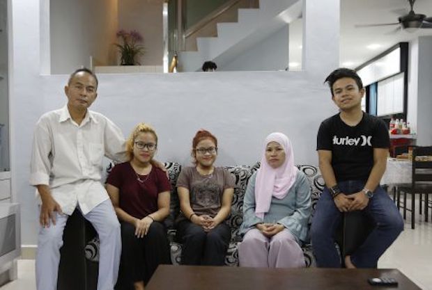Amid the ringgit’s slump, a tale of two families’ contrasting fortunes
