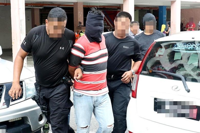 Malaysia detains 7 militants planning to kidnap, kill cops