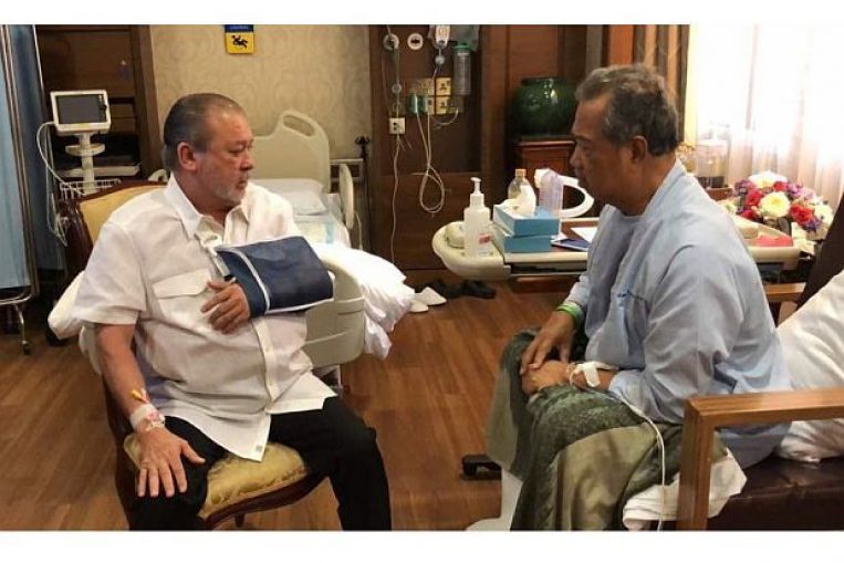 Johor ruler seeking treatment in Singapore visits Malaysia Home Minister Muhyiddin Yassin in hospital