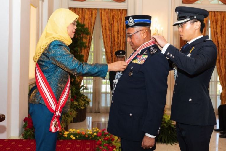 President Halimah confers Distinguished Service Order on Royal Malaysia Police chief