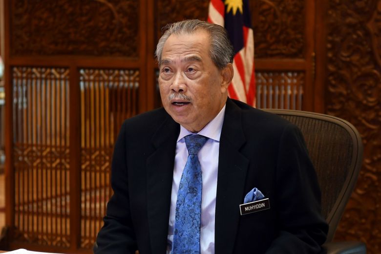 Embattled PM Muhyiddin invokes emergency plan to stay in power