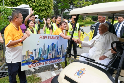 Built by migrants, Pope Francis urges fair wages for millions of foreign workers in Singapore