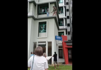 Toddler rescued from third-storey ledge of HDB in Singapore by passerby, woman assisting cops with probe into possible negligence (VIDEO)