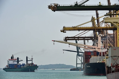 Four crew from Dutch dredger charged after worst oil spill in Singapore in a decade