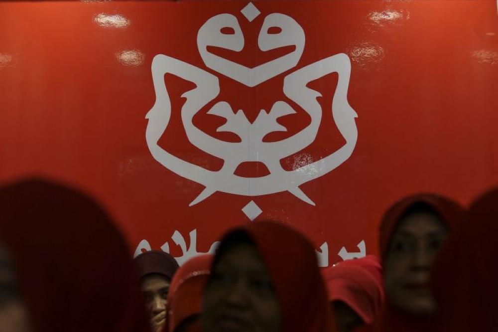 Could internal pressures push Umno to team up with Perikatan? Analysts say unlikely