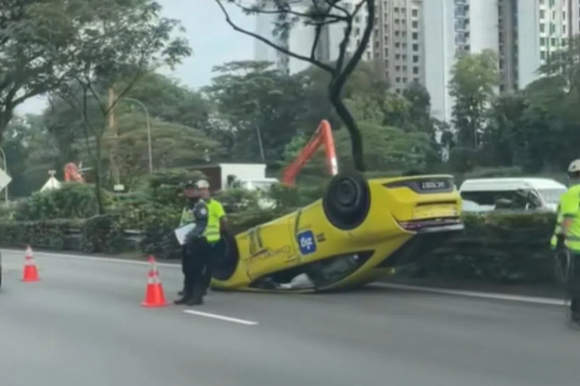Cabby, passenger taken to hospital after PIE accident causes ComfortDelGro taxi to overturn