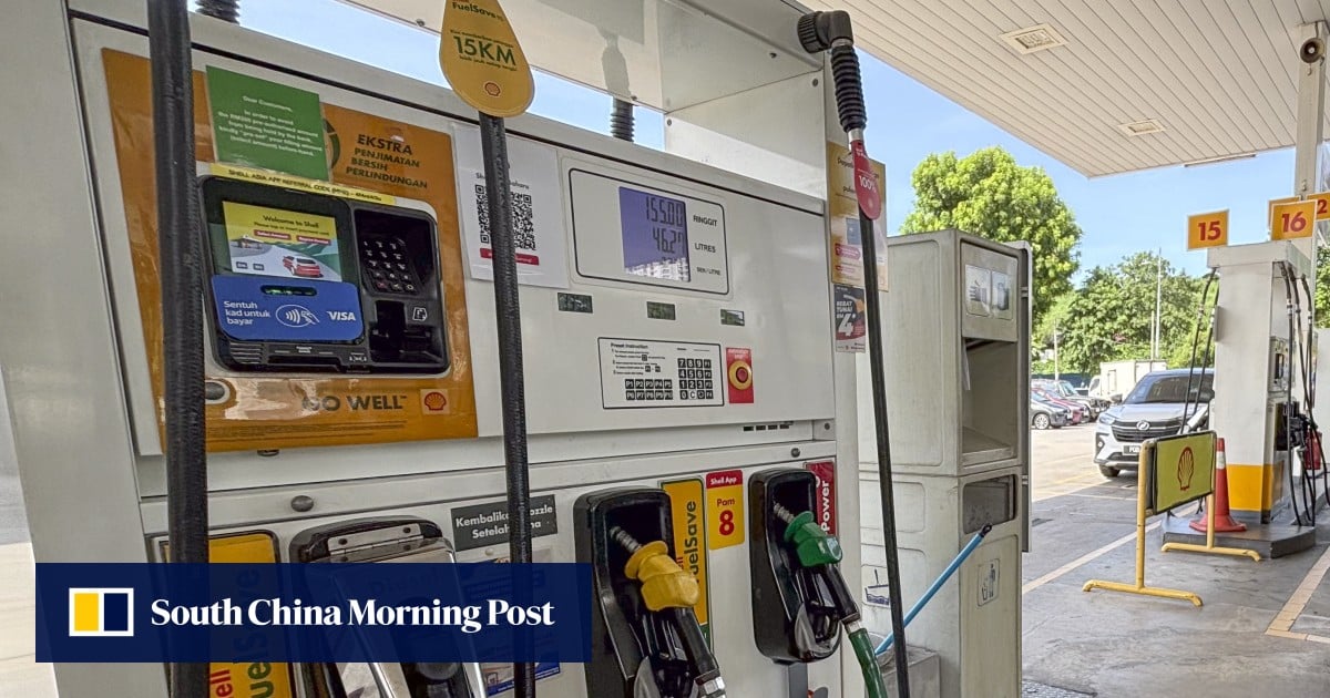 Singaporean couple in viral petrol refuelling video surrender to Malaysian police