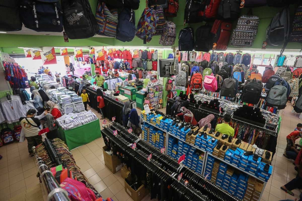 As Malaysia schools return to January start, families and educators hail structure, retailers see minimal impact