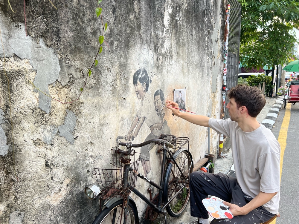 More than murals: How Ernest Zacharevic’s art tells George Town’s stories