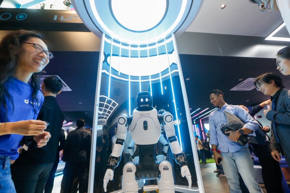 Step into the future: Malaysia’s first AI experience centre debuts with humanoids, VR and ‘doggo‑bots’