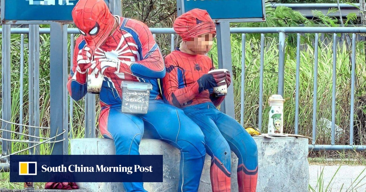 ‘Spider-Man’ beggar with girl sparks Malaysia child exploitation probe