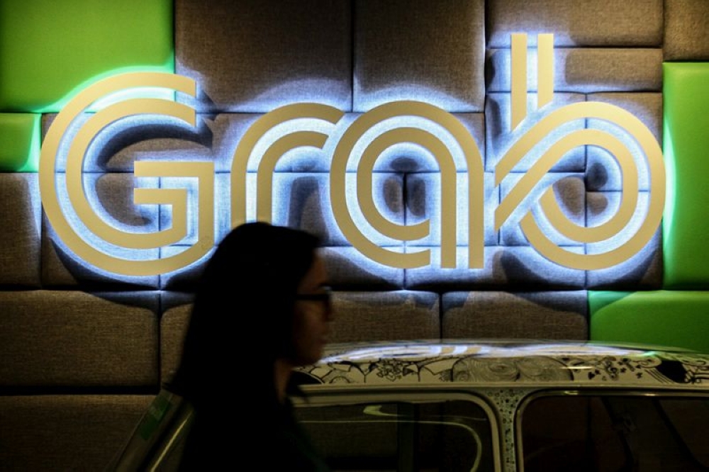 Singapore Grab rides to cost more as operator lifts fuel surcharge by 40 cents, launches S.1m support package