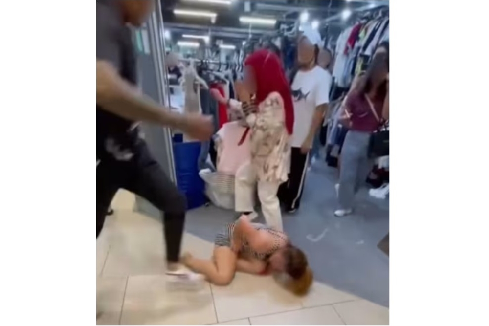 Singapore man faces charges after viral video shows him kicking woman at Lucky Plaza, police say he hit her before