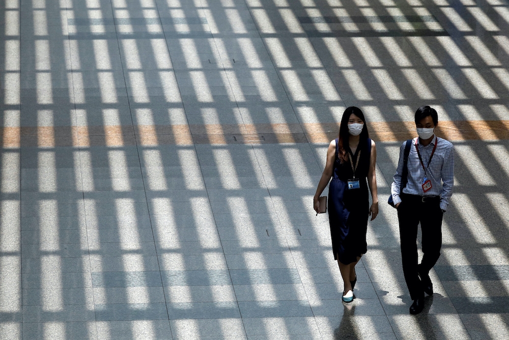 Covid-19 cases in Singapore surge nearly 60pc in a week, authorities urge caution