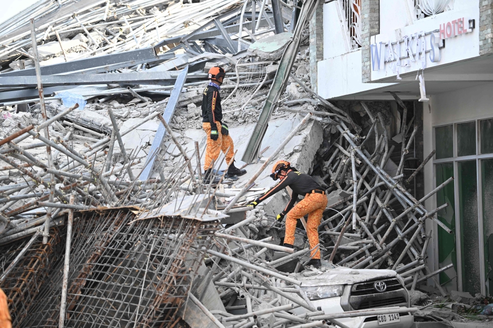 Foreign ministry confirms two Malaysians among victims in deadly Philippines building collapse, one safe
