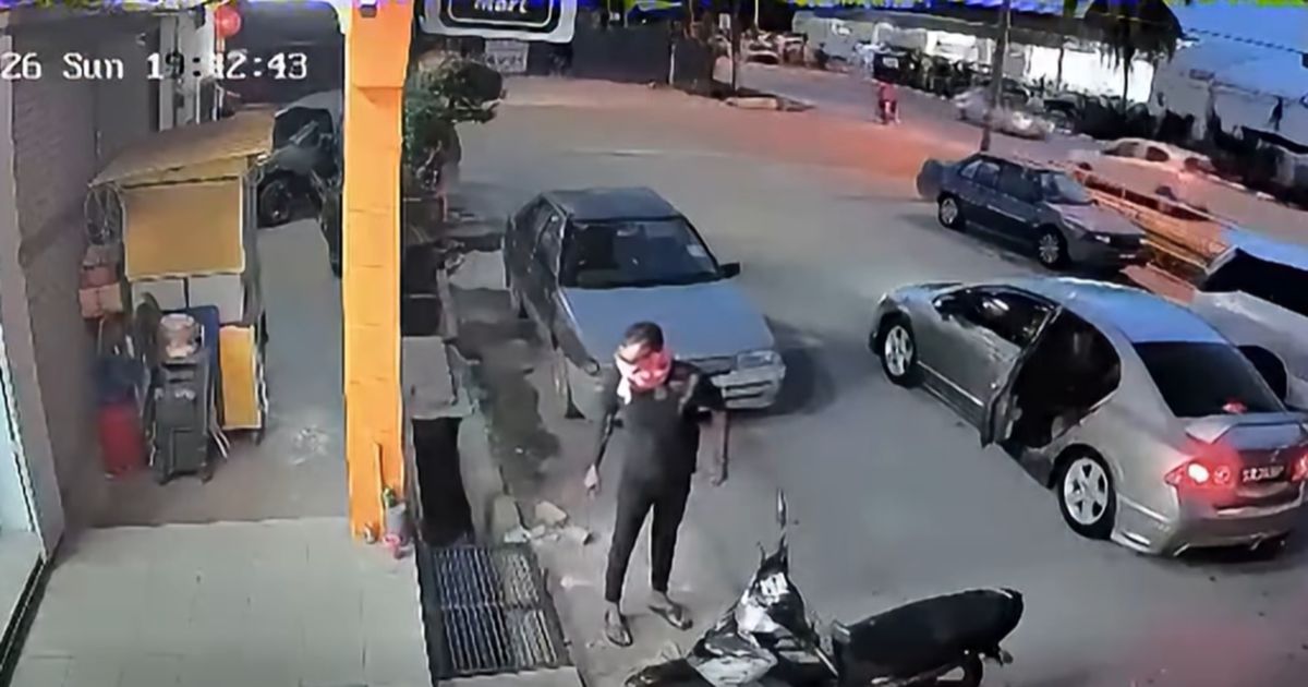 Slashed for RM500: Viral video exposes brutal parang attack on store clerk [WATCH]