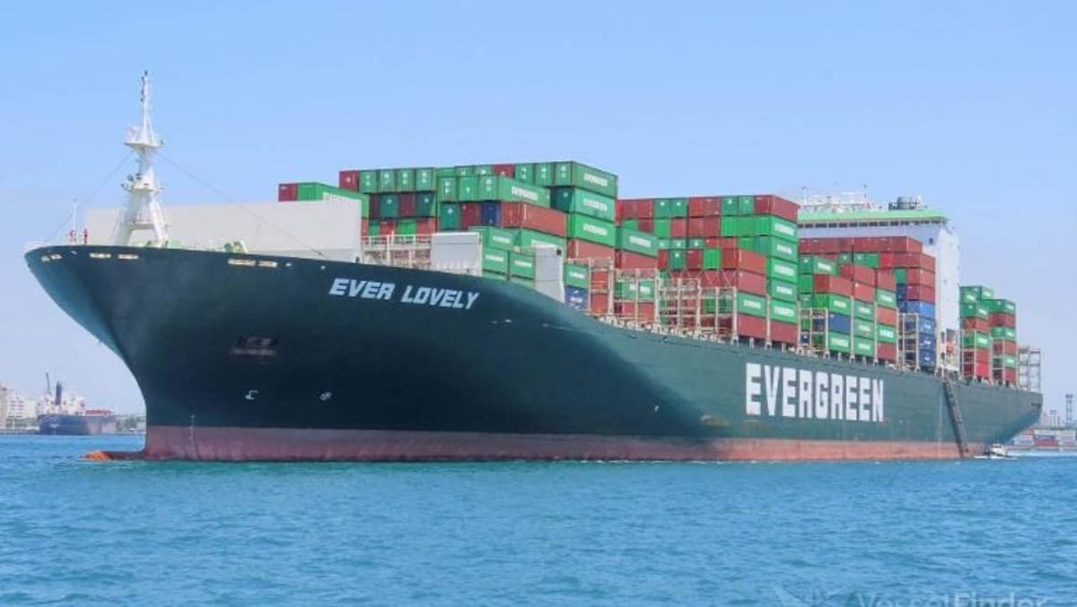 Singapore-registered ship hit by projectile in Strait of Hormuz, crew members safe