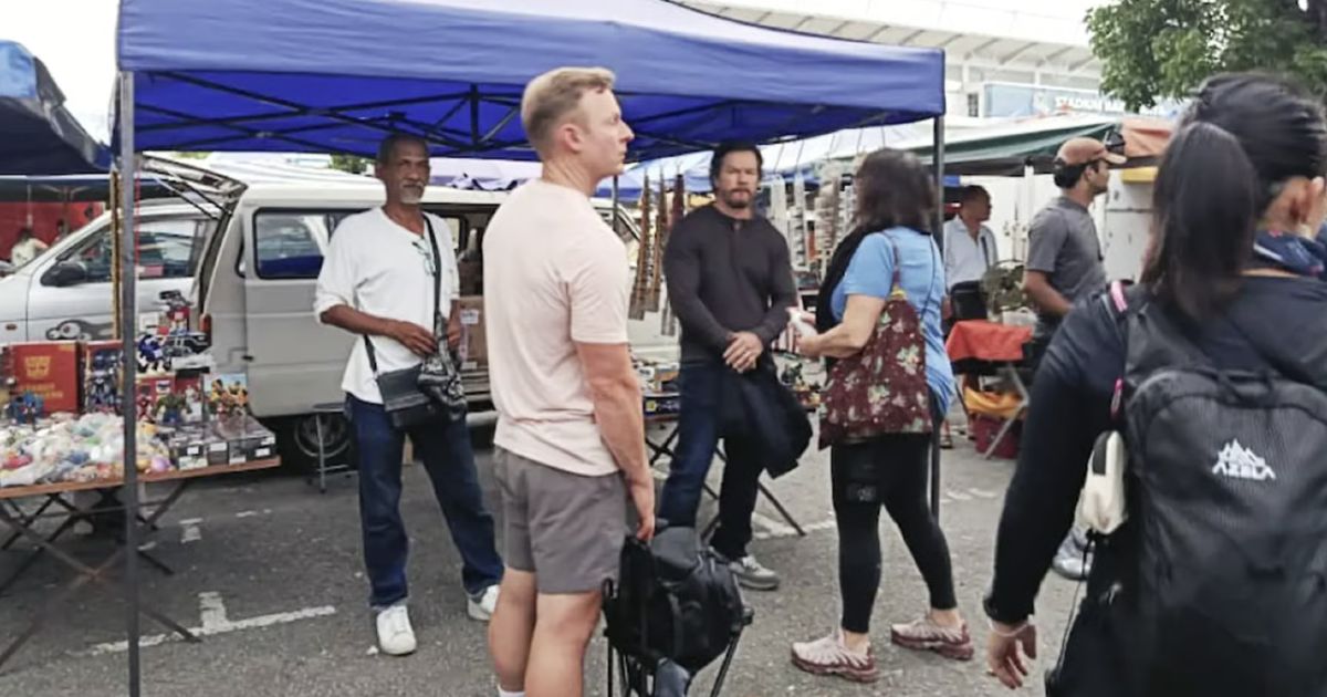 #SHOWBIZ: Stall becomes Hollywood set as trader meets Mark Wahlberg