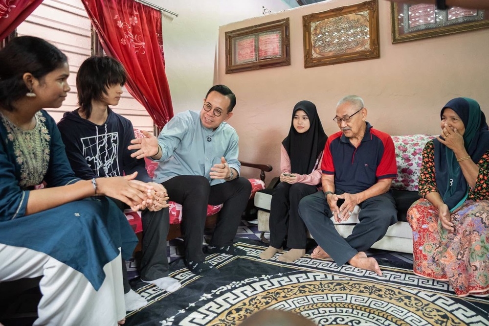 Different backgrounds, shared purpose: Merdeka spirit shines as Steven Sim’s foster children help Penang teen resume studies