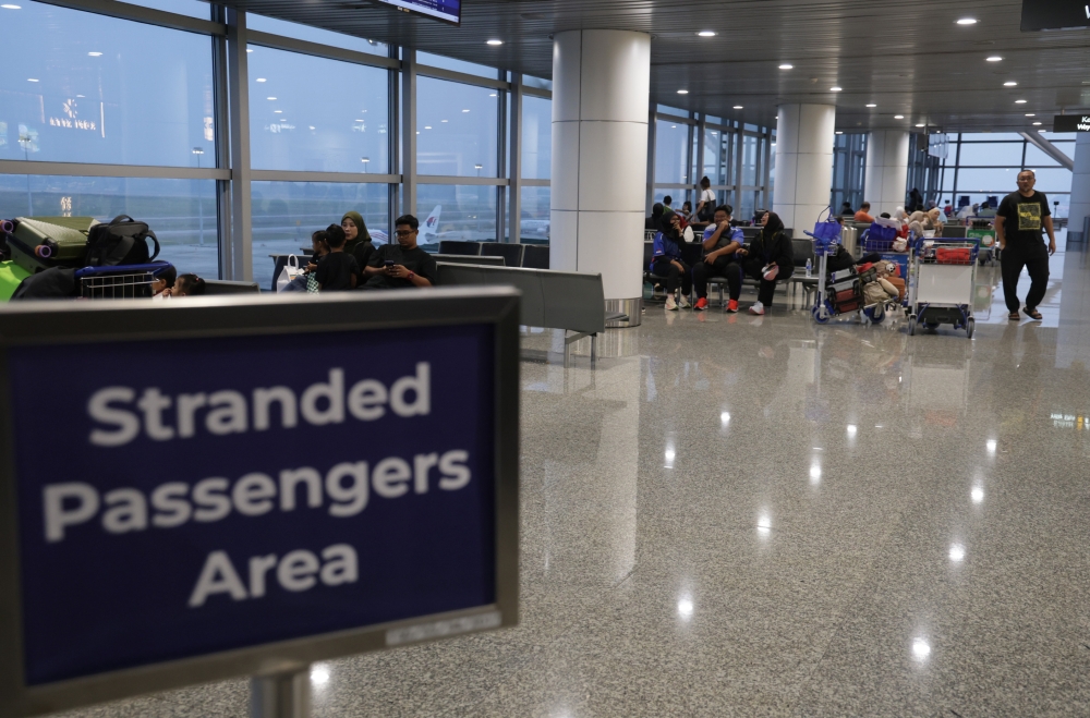 At KLIA, stranded travellers hope Jakarta flights resume soon after Anak Krakatau eruption