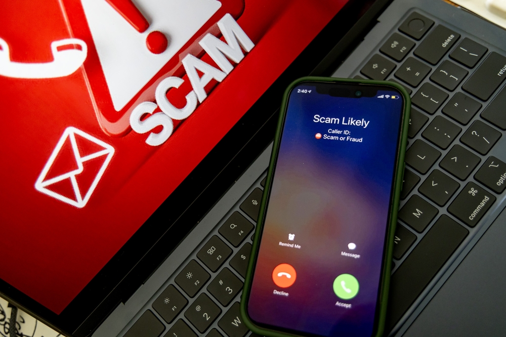 Scammers impersonating immigration staff steal S.8m from Singapore PR applicants as 148 reports lodged