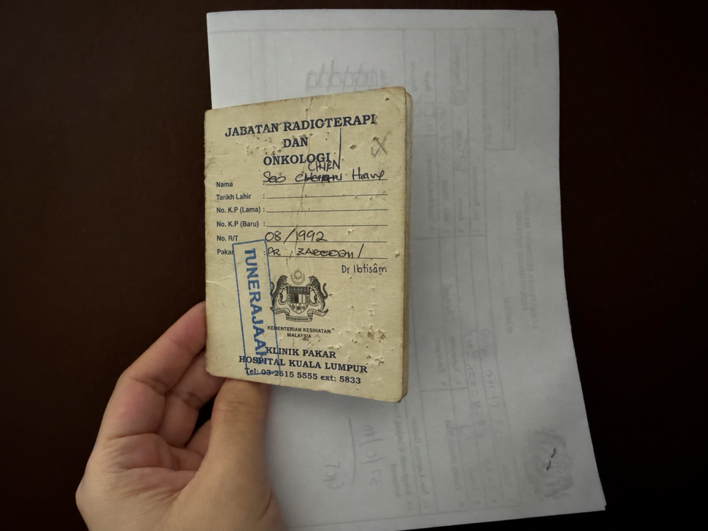 Malaysia has spent decades digitising public healthcare. Why are paper records still in use?