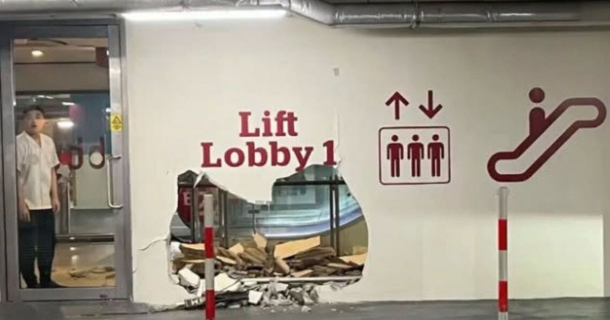 Car crashes through wall at Jem mall carpark