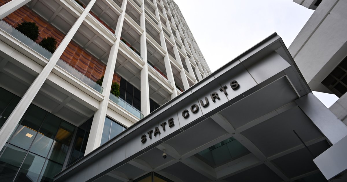 Malaysian men charged in Singapore impersonation scam